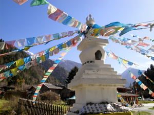 Tibetan stupa with prayer flags