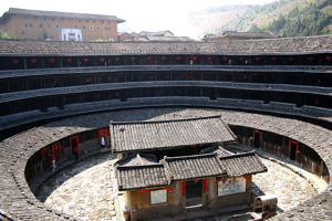 Round Hakka House, China, close up with another house in the middle