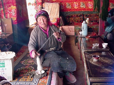 Silk road woman spinning yarn